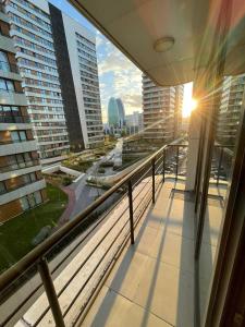 a balcony with a view of a city at Luxury apartment by versace in Istanbul