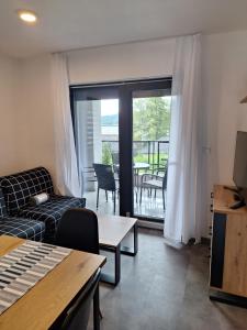 Posedenie v ubytovaní MB APARTMÁNY LIPNO