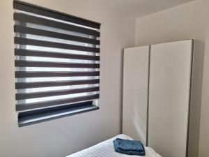 Posteľ alebo postele v izbe v ubytovaní MB APARTMÁNY LIPNO