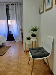 A seating area at Estudios El Quijote