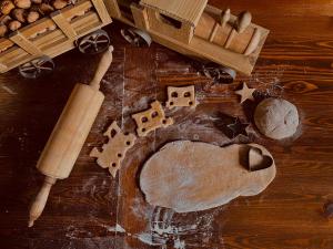 a table topped with wooden items on a wooden table at Siedlisko Nad Miedwiem in Stargard