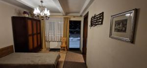 Posteľ alebo postele v izbe v ubytovaní Apartament Orkisz