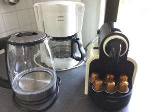Příslušenství pro přípravu čaje a kávy v ubytování Gîte des Grandsarts