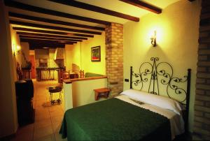 A bed or beds in a room at Complejo Rural Turimaestrat