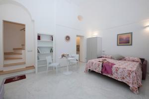 Postel nebo postele na pokoji v ubytování La Casa del Marinaio