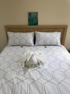 เตียงในห้องที่ Phoever Bed & Breakfast