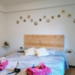 Postel nebo postele na pokoji v ubytování Montegrappa Dream