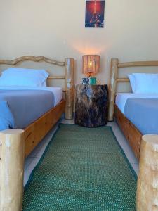 Un pat sau paturi într-o cameră la Spa Shallum
