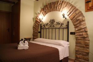 A bed or beds in a room at Complejo Rural Turimaestrat