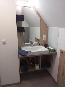 Vonios kambarys apgyvendinimo įstaigoje Landcafe SIMA & Zimmervermietung
