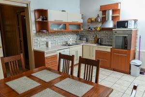 Virtuvė arba virtuvėlė apgyvendinimo įstaigoje RESIDENTIAL HOUSE