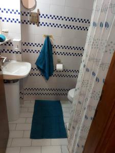 Ένα μπάνιο στο HOTEL AGNI -ENOIKIAZOMENA DIAMERIZMATA
