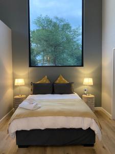 Ένα ή περισσότερα κρεβάτια σε δωμάτιο στο Am Ufer 14