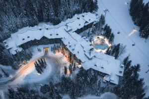 an aerial view of a resort in the snow at Blackcomb Springs Suites by CLIQUE in Whistler