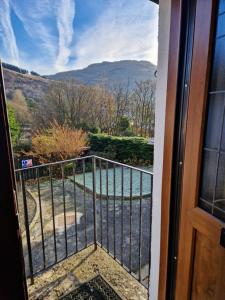 a view from the door of a balcony at Wilmar Lodge in Arrochar