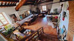 an overhead view of a living room and dining room at Agriturismo Abbazia Sette Frati a casa di Sara in Pietrafitta