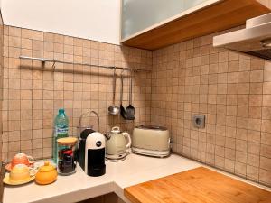 Η κουζίνα ή μικρή κουζίνα στο Private Studio Center Opera and Nevski Cathedral