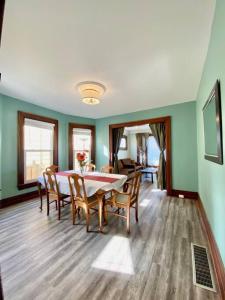 a dining room with a table and chairs at Cozy Suite-Walk to the Falls! in Niagara Falls