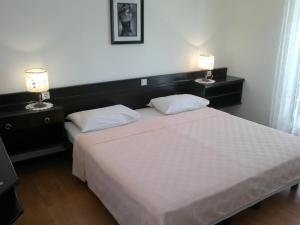 Posteľ alebo postele v izbe v ubytovaní Guest House Violeta