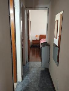 a hallway leading to a room with a hallway at Namoro alojamientos in Mar del Plata