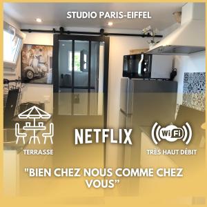ein Schild für eine Küche mit einem Kühlschrank aus Edelstahl in der Unterkunft Paris-Eiffel, bienvenue -terrasse -Netflix in Pantin