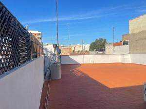 a view of a rooftop with a tennis court at UIM Mediterraneo Pablo Iglesias Wifi in Puerto de Sagunto