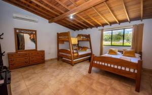 Postel nebo postele na pokoji v ubytování Hotel San Sebastian del Tonusco + 37 fotografií