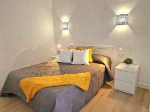 Ένα ή περισσότερα κρεβάτια σε δωμάτιο στο Relax Beachfront Vistas al Mar Studio in Tenerife