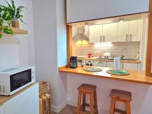 Η κουζίνα ή μικρή κουζίνα στο Relax Beachfront Vistas al Mar Studio in Tenerife