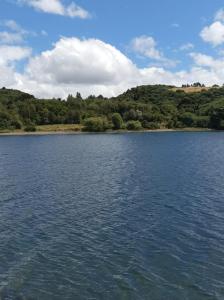 a view of a large body of water at cabañas aulen chepu chiloe in Ancud