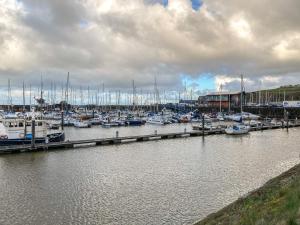a marina with many boats docked in the water at Marina View in Whitehaven