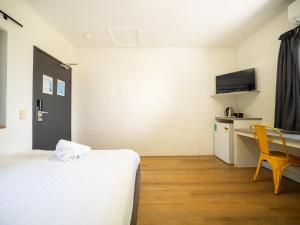 Postel nebo postele na pokoji v ubytování YHA Cape Byron, Byron Bay