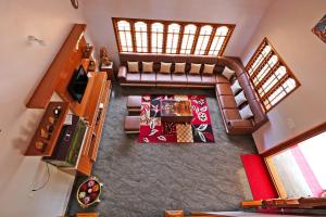 an overhead view of a living room with a couch at Kodebailu Homestay - 3BH Full Villa, Home Food, Coffee Estate in Sakleshpur