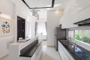 Nhà bếp/bếp nhỏ tại Xanh Villas Resort & Spa - by Bay Luxury