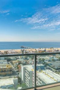 a view of a city with the ocean and buildings at Panoramic Penthouse Venice/ Marina Del Rey. in Los Angeles