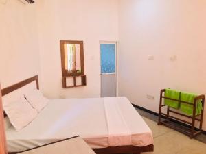 Postel nebo postele na pokoji v ubytování Abi Resort