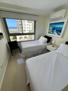 Ένα ή περισσότερα κρεβάτια σε δωμάτιο στο Imperialeluxuryapartment +49 φωτογραφίες