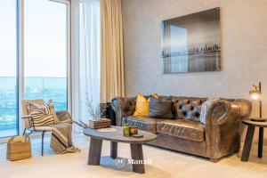 Posezení v ubytování Manzil - 2BR Apt in Al Wasl Residences with Park View, Dubai Trade Center