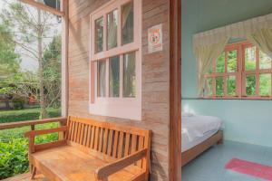 Postel nebo postele na pokoji v ubytování Pai Flora Resort