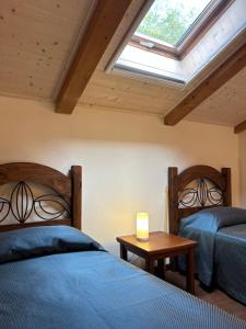 Katil atau katil-katil dalam bilik di Nutrilamente country house