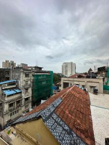 a view of a roof of a city with buildings at Rs Regency Hotel in Mumbai