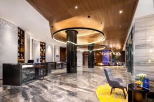 Ruang duduk di Hampton by Hilton Beijing West Railway Station Lize Business District
