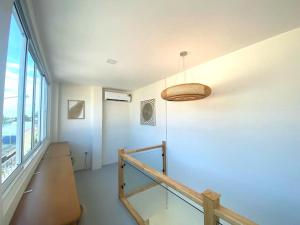 Ruang duduk di S.P.C Apartment by Brodderud