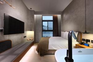 歸璞泊旅 Hotel Beore客房内的一张或多张床位