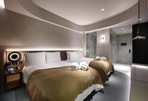 歸璞泊旅 Hotel Beore客房内的一张或多张床位