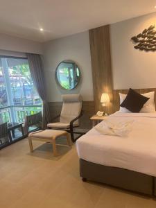 Voodi või voodid majutusasutuse Evergreen Resort toas