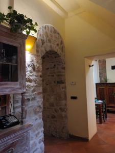 an archway in a room with a stone wall at Residenza Sant'Andrea in Campobasso