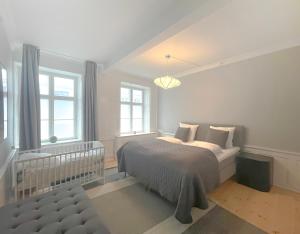 Postel nebo postele na pokoji v ubytování Homely Apartment by CPH Canals