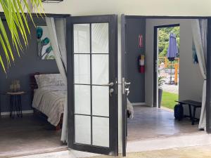 Letto o letti in una camera di The Serene House Bed & Breakfast