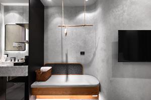 歸璞泊旅 Hotel Beore的电视和/或娱乐中心